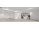 Bright and open-concept living space connected to a modern kitchen, ideal for entertaining and Gathering time at 2719 Winding Creek Trl, North Port, FL 34289