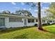 Exterior view of building showing manicured lawn and building facade at 11200 102Nd Ave # 33, Seminole, FL 33778