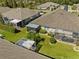 Community view showing multiple homes and landscaping at 31932 Stillmeadow Dr, Wesley Chapel, FL 33543