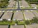 Aerial view of the house and surrounding neighborhood at 31932 Stillmeadow Dr, Wesley Chapel, FL 33543