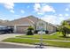 Attractive one-story home with a two-car garage and well-manicured lawn at 31932 Stillmeadow Dr, Wesley Chapel, FL 33543