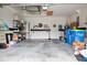 Attached garage with space for storage and workshop at 31932 Stillmeadow Dr, Wesley Chapel, FL 33543