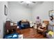 Home office with hardwood floors and ceiling fan at 31932 Stillmeadow Dr, Wesley Chapel, FL 33543