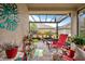 Relaxing screened patio with comfortable seating and lush landscaping at 31932 Stillmeadow Dr, Wesley Chapel, FL 33543