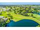 Aerial view of peaceful golf course with water features at 4201 Neil Ln, Bradenton, FL 34208