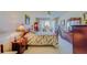 Spacious bedroom with a king-size bed and ample furniture at 8 Belleview Blvd # 408, Belleair, FL 33756