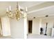 Elegant dining room with chandelier at 8 Belleview Blvd # 408, Belleair, FL 33756