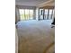 Bright living room with large windows at 8 Belleview Blvd # 408, Belleair, FL 33756