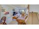 Living room with floral sofa and view at 8 Belleview Blvd # 408, Belleair, FL 33756