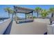 Relaxing waterfront pergola with seating at 8 Belleview Blvd # 408, Belleair, FL 33756