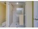 Clean shower with glass enclosure and tiled walls at 8 Belleview Blvd # 408, Belleair, FL 33756