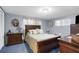 Bedroom featuring a comfortable bed, natural light, and coordinated decor for a peaceful ambiance at 5479 Pinehurst Dr, Spring Hill, FL 34606