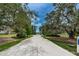 Private community road leading to lake access at 11833 Castine St, New Port Richey, FL 34654