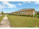 Well-maintained home exterior with curb appeal at 5502 Limelight Dr, Apollo Beach, FL 33572