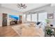 Comfortable living room featuring a large television and decorative accents at 5502 Limelight Dr, Apollo Beach, FL 33572