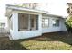 Enclosed porch with table and chairs, offering outdoor space at 4254 96Th N Ter # Two, Pinellas Park, FL 33782