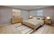 Bright bedroom with a comfortable bed and neutral decor at 1949 Kings Hwy, Clearwater, FL 33755