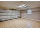 Spacious garage with tiled floor and automatic garage door opener at 1949 Kings Hwy, Clearwater, FL 33755