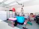 Garage with storage and additional space for hobbies or activities at 8731 Sanders Tree Loop, Wesley Chapel, FL 33545