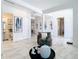 Spacious living area with marble floors and modern decor at 8731 Sanders Tree Loop, Wesley Chapel, FL 33545