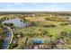 Aerial view of golf course and pickleball courts at 7925 Royal Queensland Way, Lakewood Ranch, FL 34202