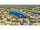 Luxury home on a lake, with a golf course nearby at 7925 Royal Queensland Way, Lakewood Ranch, FL 34202