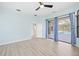 Light and bright bedroom with pool view and updated flooring at 7925 Royal Queensland Way, Lakewood Ranch, FL 34202