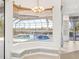 Stunning view of the pool and backyard from inside at 7925 Royal Queensland Way, Lakewood Ranch, FL 34202