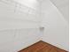 Spacious walk-in closet with wire shelving at 7925 Royal Queensland Way, Lakewood Ranch, FL 34202