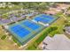 Community tennis courts with ample parking nearby at 1001 Tartan Dr # 207, Palm Harbor, FL 34684