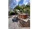 Hot tub nestled in a tropical backyard setting at 2716 Miriam S St, Gulfport, FL 33711