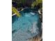 Refreshing swimming pool with water features at 2716 Miriam S St, Gulfport, FL 33711