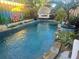 Inviting swimming pool with a relaxing patio area at 2716 Miriam S St, Gulfport, FL 33711