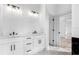 Modern bathroom with white cabinets and hexagon tile floor at 7306 Exter Way, Tampa, FL 33615