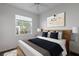 Bright bedroom featuring a neutral color scheme and ample natural light at 819 Tremont Greens Ln, Sun City Center, FL 33573