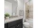 Bathroom featuring a tiled shower and granite countertops at 10111 Craftsman Park Way, Palmetto, FL 34221