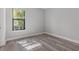 Neutral bedroom with wood floors and baseboard trim at 10111 Craftsman Park Way, Palmetto, FL 34221