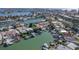 Aerial view shows home's location on the canal, with water access at 17710 Long Point Dr, Redington Shores, FL 33708