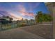 Paved patio overlooks canal at sunset at 17710 Long Point Dr, Redington Shores, FL 33708