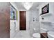 Stylish bathroom, featuring marble tile and a glass shower at 226 5Th N Ave # 1406, St Petersburg, FL 33701