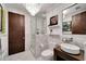 Modern bathroom with subway tile, walk-in shower, and floating vanity at 226 5Th N Ave # 1406, St Petersburg, FL 33701