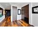 Elegant hallway with hardwood floors and modern wood doors at 226 5Th N Ave # 1406, St Petersburg, FL 33701