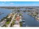 Waterfront property with a modern two-story house and private dock at 7949 2Nd S Ave, St Petersburg, FL 33707