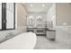 Luxurious bathroom with freestanding bathtub and marble at 7949 2Nd S Ave, St Petersburg, FL 33707