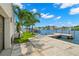 Spacious patio area with waterfront views, perfect for relaxation at 7949 2Nd S Ave, St Petersburg, FL 33707