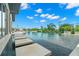 Stunning infinity pool with stone deck and water view at 7949 2Nd S Ave, St Petersburg, FL 33707