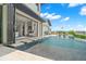 Luxury pool with patio and access from the interior living space at 7949 2Nd S Ave, St Petersburg, FL 33707