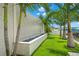 Tranquil water feature adds serenity to the backyard landscape at 7949 2Nd S Ave, St Petersburg, FL 33707