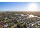 Wide aerial view of a waterfront neighborhood featuring houses and access to the water at 1367 51St Ne Ave, St Petersburg, FL 33703