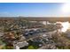 Aerial view of a waterfront property showcasing the pool, boat dock, and canal access at 1367 51St Ne Ave, St Petersburg, FL 33703